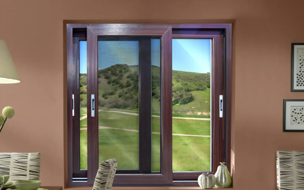 White uPVC sliding windows in a Vijayawada home by Styling Space, with a bright city view.